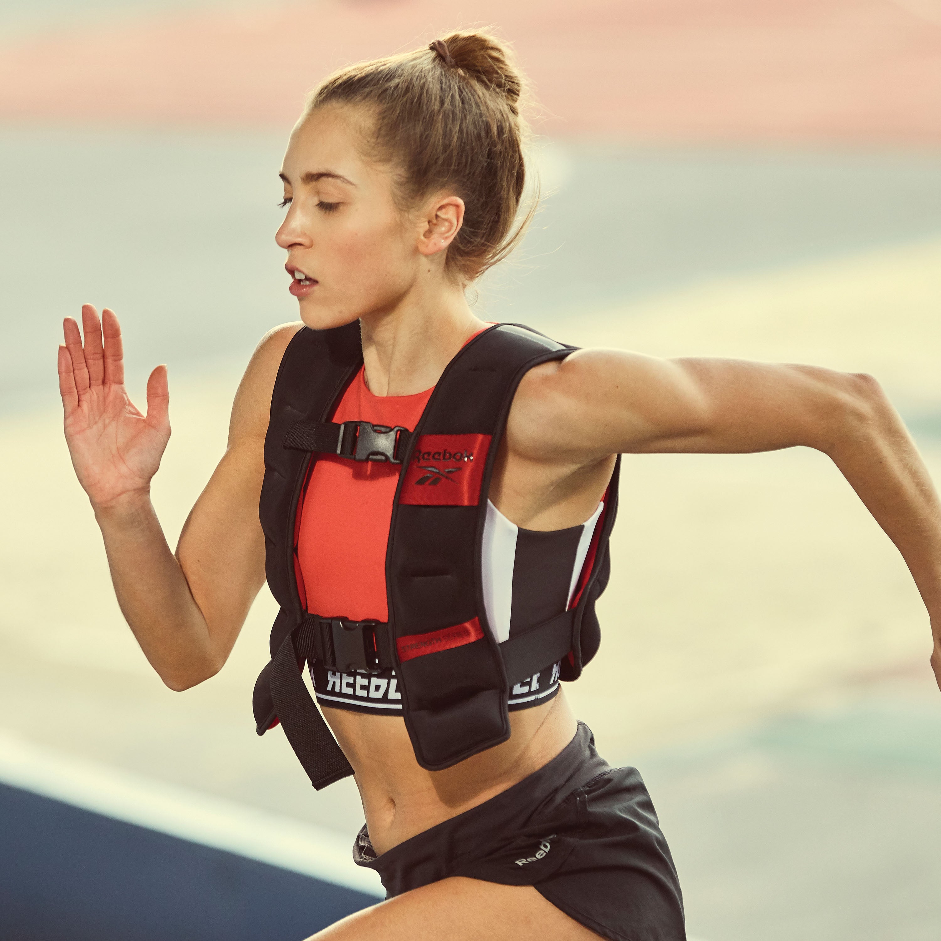 Reebok Strength Series Weight Vest 12LB on woman running