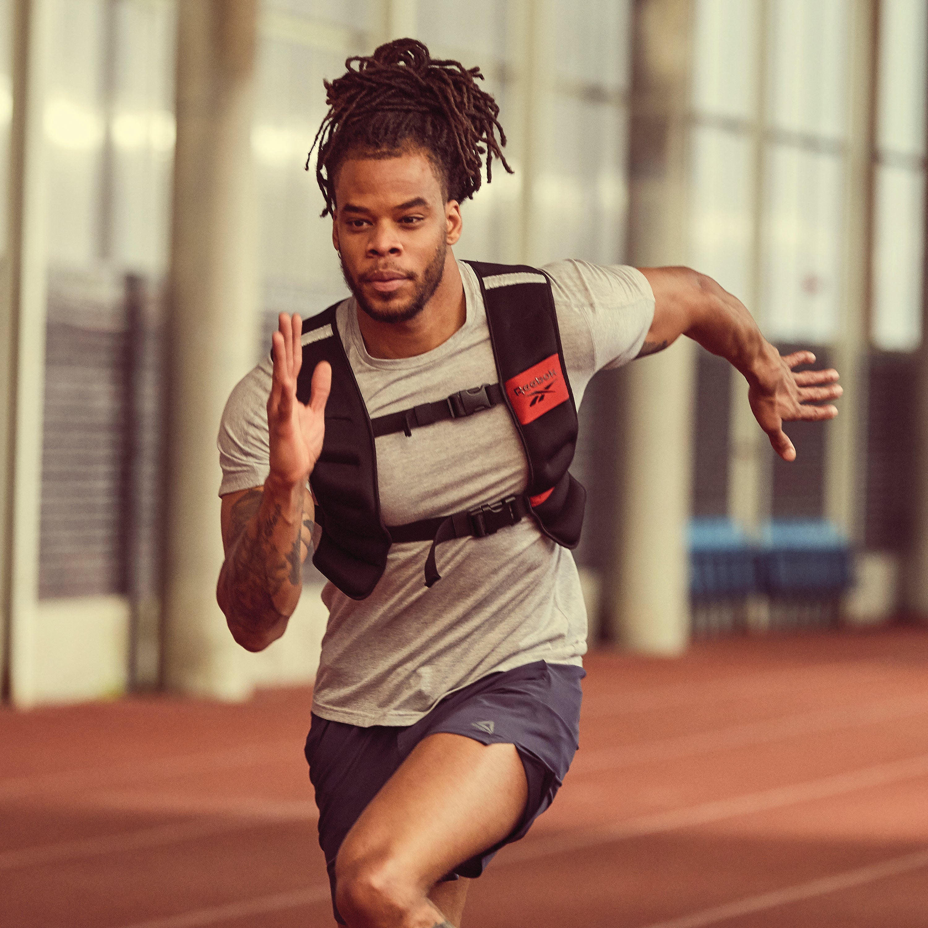 Reebok Strength Series Weight Vest 20LB on man running