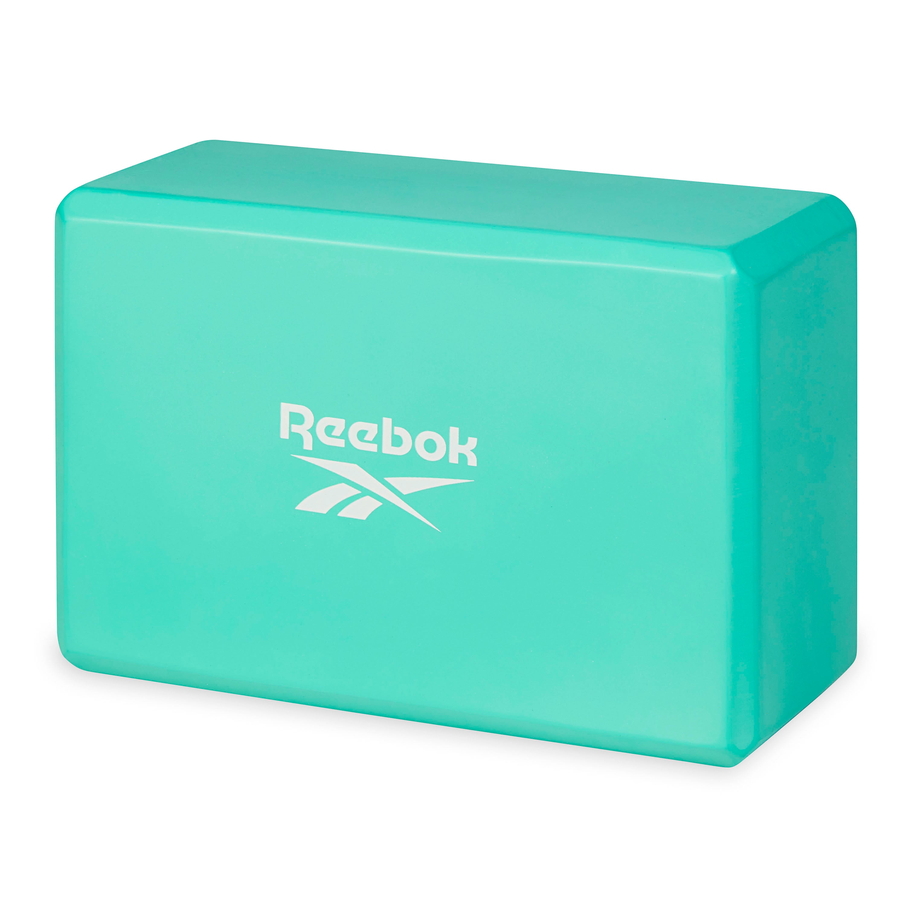 Teal yoga block with Reebok logo on a white background